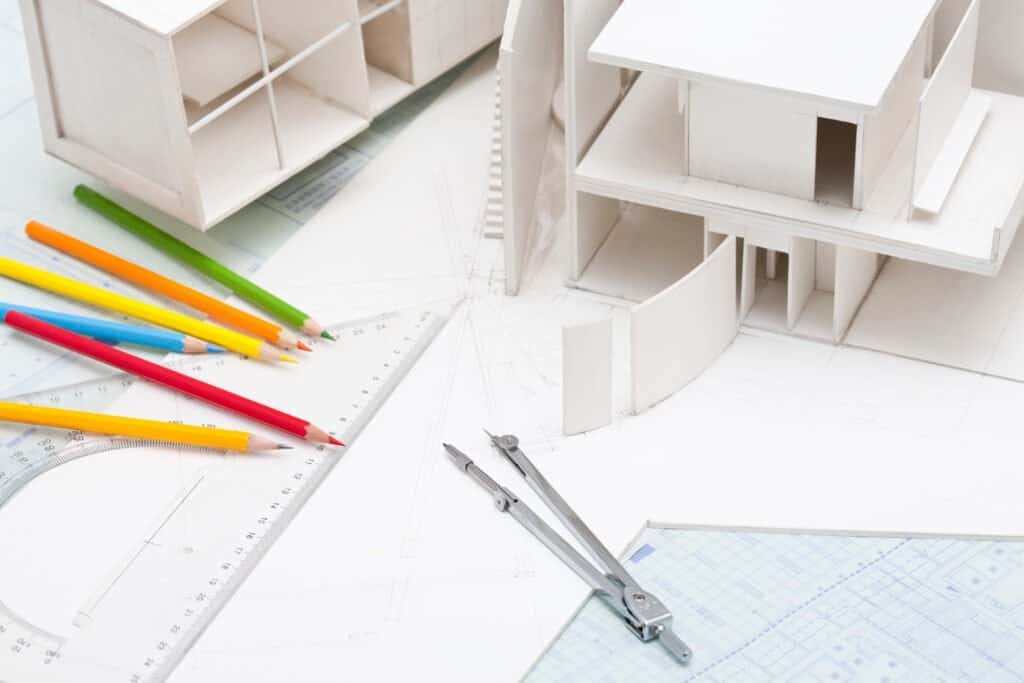 Blueprint and architectural models for construction projects and home remodeling.