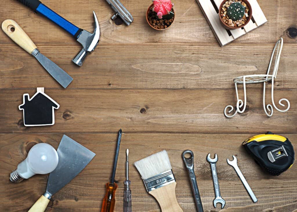 Meticulous home renovation tools on wooden surface for professional construction projects.